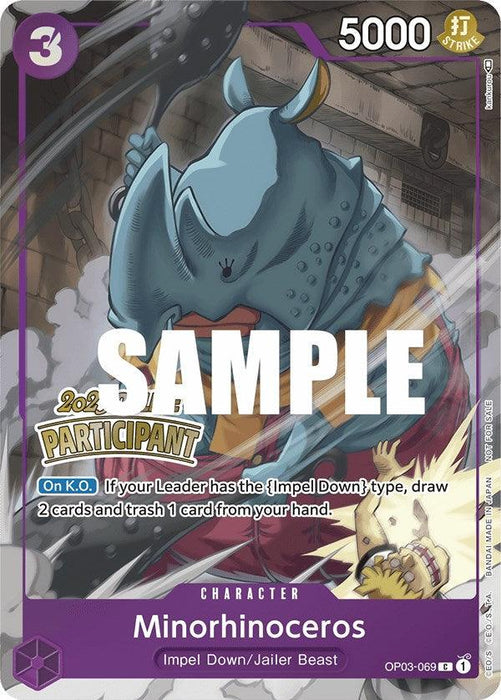 A trading card titled "Minorhinoceros" from the "Impel Down/Jailer Beast" series. This *Minorhinoceros (Online Regional 2023) [Participant] [One Piece Promotion Cards]* by Bandai features a large blue rhino character in grey bondage gear. The text indicates it has 5000 power and details its abilities when knocked out. A "2023 PARTICIPANT" badge is also visible.