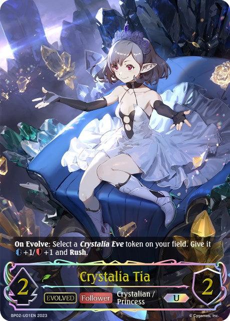 A fantasy card game image depicts "Crystalia Tia (BP02-U01EN) [Reign of Bahamut]," an evolved Crystallian/Princess follower from the Reign of Bahamut set by Bushiroad. She sits elegantly on a blue, cushioned throne, wearing a white, flowing dress with black gloves and headwear. The card details her stats: 2 attack, 2 defense, and her evolve ability is described.