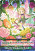 A vibrant fantasy image featuring a young fairy with blonde hair and green wings, hovering amidst a lush array of colorful flowers. The card's text reads: "The magic of blessing that heralds blossoming. Blessing to the Flowering Buds. Until end of turn...". This rare card, Blessing to the Flowering Buds (D-BT12/056EN) [Evenfall Onslaught], belongs to Bushiroad.