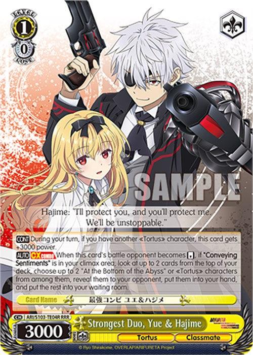 A trading card features two characters: a white-haired boy with an eyepatch holding a gun, and a blonde-haired girl in a red dress. The background shows flames on this Triple Rare card. The text and stats are at the bottom, with the title "Strongest Duo, Yue & Hajime (ARI/S103-TE04R RRR) [Arifureta: From Commonplace to World's Strongest]," from *Arifureta: From Commonplace to World's Strongest*, including attributes and Brand Name: Bushiroad.