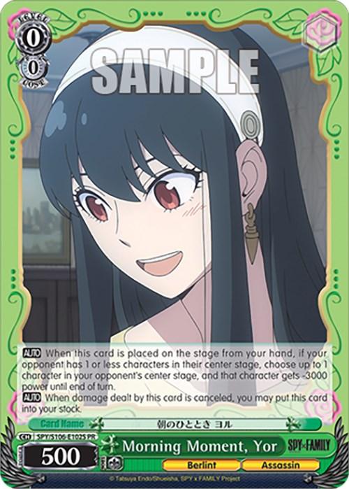 A trading card featuring the character Yor Forger from the series "SPY x FAMILY." She has dark hair with bangs and a bright smile, wearing a white headband and a mint green outfit. The card, Morning Moment, Yor (SPY/S106-E102S PR) [SPY x FAMILY], a special promo edition by Bushiroad, has green borders with text detailing its abilities and stats, including "500" power and "0" cost level.