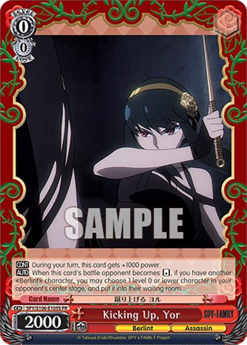 The promo trading card Kicking Up, Yor (SPY/S106-E105S PR) [SPY x FAMILY] by Bushiroad features Yor from SPY x FAMILY. Yor, depicted with red eyes and black hair tied up, wields a katana and strikes an assertive pose against a dark background. The character card boasts a decorative red and gold border with text that includes character stats and the title "Kicking Up, Yor.