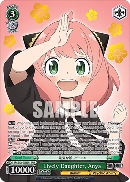 The image is a Character Card featuring a cheerful SPY x FAMILY character named Anya with pink hair and green eyes. She has one hand raised in a playful gesture near her forehead, wearing a black dress with yellow and red embellishments. The background is pink with yellow flower motifs and filled with text and stats. The card, titled "Lively Daughter, Anya (SPY/S106-E035SPY SPYR) [SPY x FAMILY]," is produced by Bushiroad.