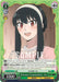 A Triple Rare trading card featuring a character with long black hair, red eyes, and a white hairband. She is wearing a light pink dress with a white collar. The card has text and stats, including a value of 1000. The green border includes icons and numbers for gameplay use in Entrance Examination, Yor (SPY/S106-TE16R RRR) [SPY x FAMILY] by Bushiroad.