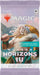 Image of a Magic: The Gathering Modern Horizons 3 - Play Booster Pack. The pack showcases a majestic lion-man warrior with a muscular build holding a large golden axe. The packaging highlights it contains 14 cards and is suitable for ages 13 and up. Text reads "The best of draft and set boosters!
