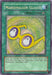 A Yu-Gi-Oh! Secret Rare spell card titled "Marshmallon Glasses [PP01-EN004]" from Premium Pack 1 features a green border and an illustration of yellow glasses with marshmallow lenses, smiling at each other. As a Continuous Spell, its effect ensures that with "Marshmallon" on your field, opponents can't target other cards.