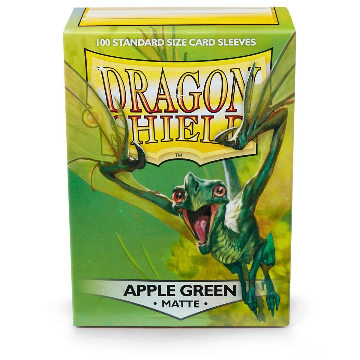 A green box of Dragon Shield: Standard 100ct Sleeves - Apple Green (Matte) from Arcane Tinmen features a small dragon emerging from the right side. The text at the top reads 