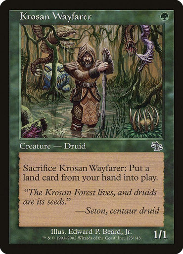 The Magic: The Gathering card named "Krosan Wayfarer [Judgment]" features a green border, indicating its affiliation with the green color set. The artwork showcases a hooded Human Druid standing in a swamp and holding a staff. The card text describes its abilities and includes a quote from Seton, a centaur druid.