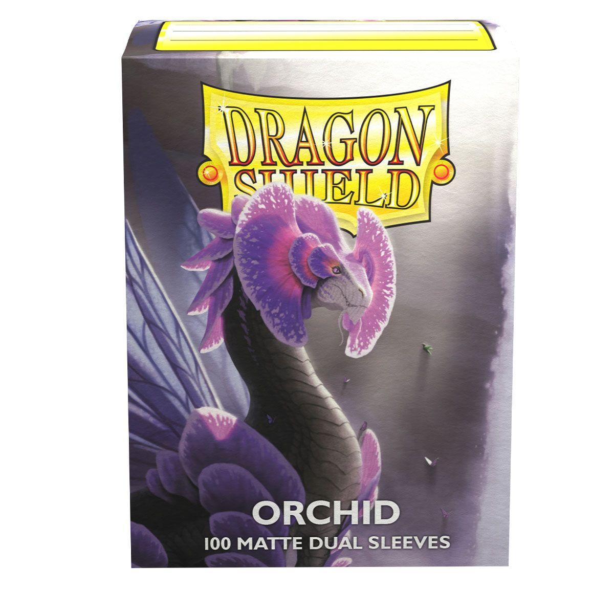 Box of Arcane Tinmen Dragon Shield: Standard 100ct Sleeves - Orchid (Dual Matte) features artwork of a mythical creature resembling a dragon with purple wings and orchid-like features on its head. The text 