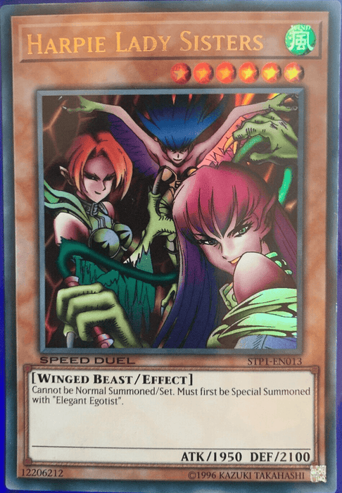 Yu-Gi-Oh! Harpie Lady Sisters [STP1-EN013] Ultra Rare features three female warriors with sharp claws and feathered wings, poised for battle. Categorized as a Wind attribute, Level 6 winged-beast/effect monster with 1950 ATK and 2100 DEF, it highlights a special summoning requirement.