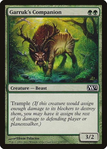 Garruk's Companion [Magic 2012] is an impressive Magic: The Gathering card, showcasing a Creature — Beast adorned with antlers and surrounded by a green aura. It features power and toughness stats of 3/2 along with the Trample ability. The vibrant illustration by Efrem Palacios is elegantly set against its signature green border.