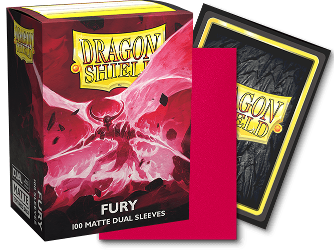 A box of Arcane Tinmen Dragon Shield: Standard 100ct Sleeves - Fury (Dual Matte) is shown. The box features red and yellow fiery artwork on the front with a yellow label displaying "Dragon Shield." Beside the box are two TCG card sleeves: one red and the other showcasing the back design in black with a yellow border.