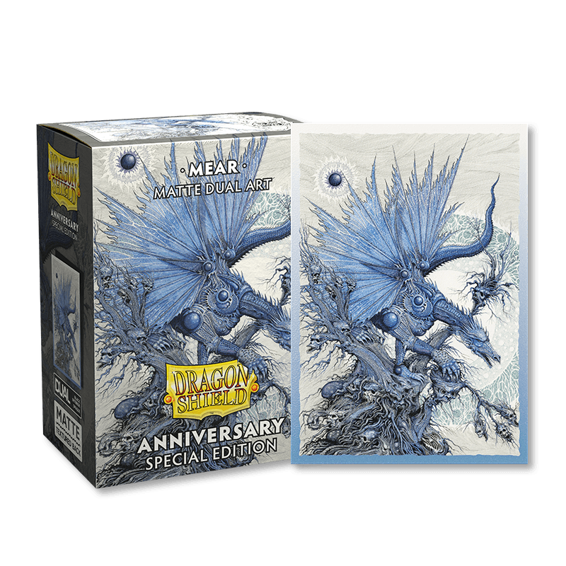 The image shows an Arcane Tinmen box with artwork titled "Mear" in a special edition for their anniversary. The box and corresponding TCG card feature intricate, swirling designs of a blue, mechanical dragon-like creature with large wings against a light background, perfectly matching the Dragon Shield: Standard 100ct Sleeves - Special Anniversary - Mear (Dual Matte).