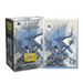 The image shows an Arcane Tinmen box with artwork titled "Mear" in a special edition for their anniversary. The box and corresponding TCG card feature intricate, swirling designs of a blue, mechanical dragon-like creature with large wings against a light background, perfectly matching the Dragon Shield: Standard 100ct Sleeves - Special Anniversary - Mear (Dual Matte).