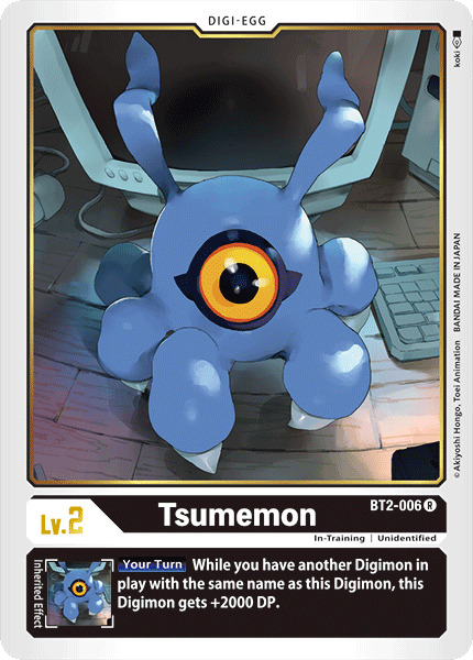A Rare Tsumemon [BT2-006] [Release Special Booster Ver.1.0] card from Digimon, featured in Release Special Booster Ver.1.0. The card shows a blue, one-eyed Digimon with tentacle-like appendages on a computer desk. It's a Level 2, BT2-006 card with an Inherited Effect that boosts its DP by 2000 if another Digimon with the same name