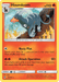 A Pokémon trading card titled "Houndoom (46/214) [Sun & Moon: Lost Thunder]" from the Pokémon series. It has 110 HP and evolves from Houndour. The card features Houndoom, a black canine Pokémon with curved horns and orange bands, against a fiery background. Its moves are "Nasty Plot" and "Attack Operation." The card is number 46/214.