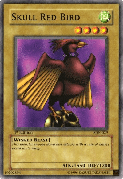 The image features a Yu-Gi-Oh! trading card named "Skull Red Bird [SDK-029] Common." This Normal Monster depicts a red-feathered bird with sharp claws and glowing eyes, standing atop a skull. With 4 stars, it boasts 1550 attack points and 1200 defense points. "Skull Red Bird [SDK-029] Common" was part of Kaiba's Starter Deck.
