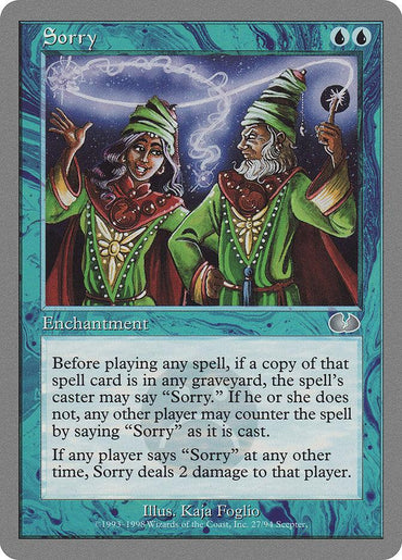 A "Sorry [Unglued]" Magic: The Gathering card features two wizards in green robes casting spells—one with a wand, the other with a scroll. This enchantment has blue borders, uncommon rarity, and counters an opponent's spell. Illustrated by Kaja Foglio.