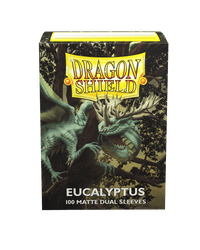 Dragon Shield: Standard 100ct Sleeves - Eucalyptus (Dual Matte) by Arcane Tinmen features a green dragon illustration. These 100 matte dual sleeves offer impressive seal strength with the Dragon Shield logo for quality protection and style.