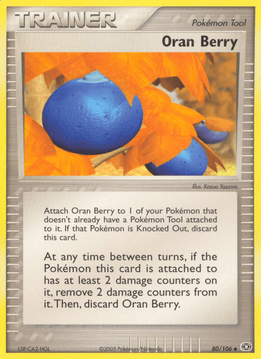A Pokémon product titled "Oran Berry (80/106) [EX: Emerald]" from the brand Pokémon. The artwork shows a close-up of three blue berries hanging from a plant with orange leaves. Detailed text explains how attaching Oran Berry to a Pokémon removes damage counters and leads to its discard after use.