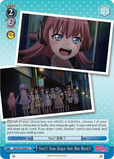 The Yes!! You Guys Are the Best!! (BD/W73-E095 U) [BanG Dream! Vol.2] trading card from Bushiroad features two images: the top shows a close-up of a smiling girl with pink hair and blue eyes, wearing headphones, while the bottom depicts RAISE A SUILEN standing together on a street at night. Text and game stats are displayed below on this Blue Event Card.