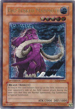 A Yu-Gi-Oh! trading card from the Flaming Eternity set featuring "Big-Tusked Mammoth [FET-EN015] Ultimate Rare." This Ultimate Rare Effect Monster is illustrated with large tusks, purple fur, and stands amidst icebergs. Its beast/effect ability prevents opponents' monsters from changing their battle position. The card has 2000 ATK and 1000 DEF.