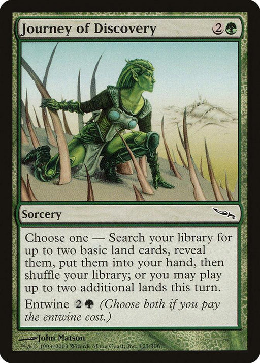 A Magic: The Gathering card named "Journey of Discovery [Mirrodin]." It has green framing and a green mana symbol. The art, by John Matson, shows a green-skinned elf in a forest surrounded by sharp, tall plants. The card text offers two choices regarding basic land cards and features an entwine cost option.