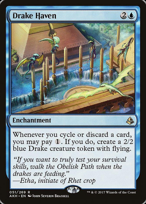 A Magic: The Gathering card titled "Drake Haven [Amonkhet]," an enchantment from Magic: The Gathering. The art depicts flying blue drakes near a rectangular water structure with columns. Text reads: "Whenever you cycle or discard a card, you may pay 1. If you do, create a 2/2 blue Drake creature token with flying." Quote: "If you want to truly test