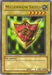 The image shows an Ultra Rare "Yu-Gi-Oh!" trading card named "Millennium Shield [MP1-001] Ultra Rare." It depicts a shield with the Eye of Horus in the center, with four stars above it and a green background. The card is labeled "MP1-001" from the McDonald's Promotional Cards series and has attributes: Normal Monster, Warrior type, ATK 0, DEF 300.