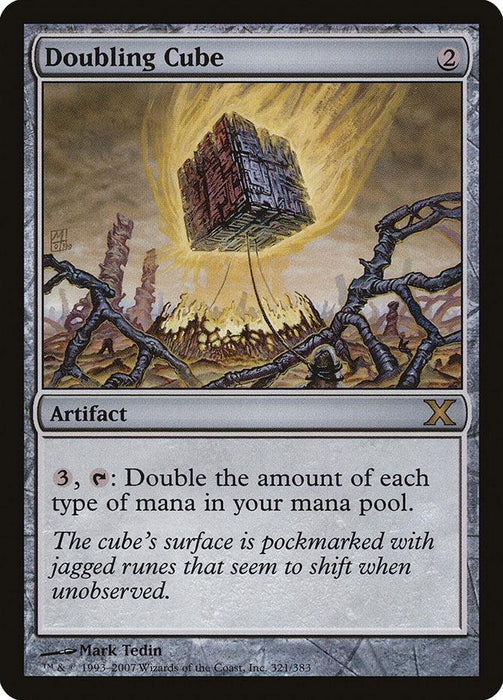 A Magic: The Gathering card called "Doubling Cube [Tenth Edition]." This rare artifact has a casting cost of 2 colorless mana. The image shows a floating, jagged, rune-inscribed cube. The card's ability, which costs 3 mana and tapping, doubles the mana in the player's pool. Illustrator: Mark Tedin.
