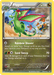 A rare Pokémon trading card featuring Flygon (76/111) [XY: Furious Fists]. Flygon is depicted in flight over a desert landscape with rocks and clouds in the background. The card showcases Flygon's stats: 130 HP, an ability named "Rainbow Shower," and a "Sand Sweep" attack from the Furious Fists series. Illustrated by Masakazu Fukuda.
