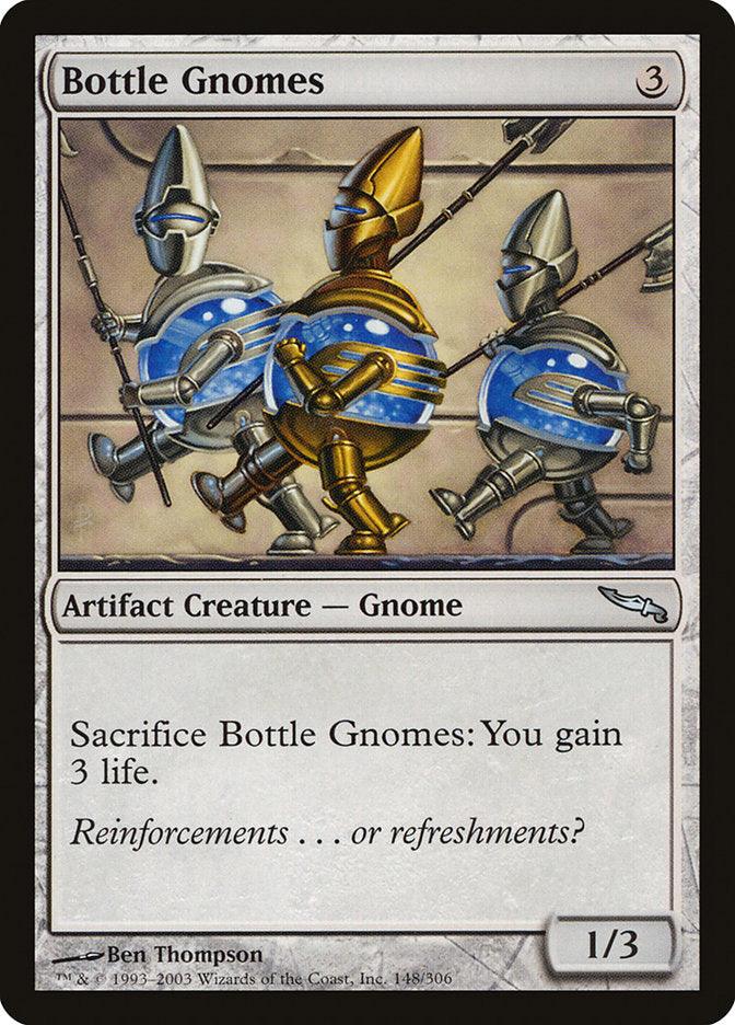 The artifact creature card "Bottle Gnomes [Mirrodin]" from Magic: The Gathering showcases three armed gnomes with bottle-shaped torsos and helmets. Costing 3 mana, this card features the ability, "Sacrifice Bottle Gnomes: You gain 3 life," and has power and toughness ratings of 1/3.