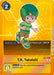 The image features an exclusive Digimon card titled "T.K. Takaishi [ST3-12] (Alternate Art)" from the Starter Deck: Jesmon series. It depicts T.K., the tamer, wearing a green hat and striped shirt, smiling as he runs against a vibrant yellow backdrop. This card has a play cost of 2 and includes a security effect allowing it to be played without any memory cost.