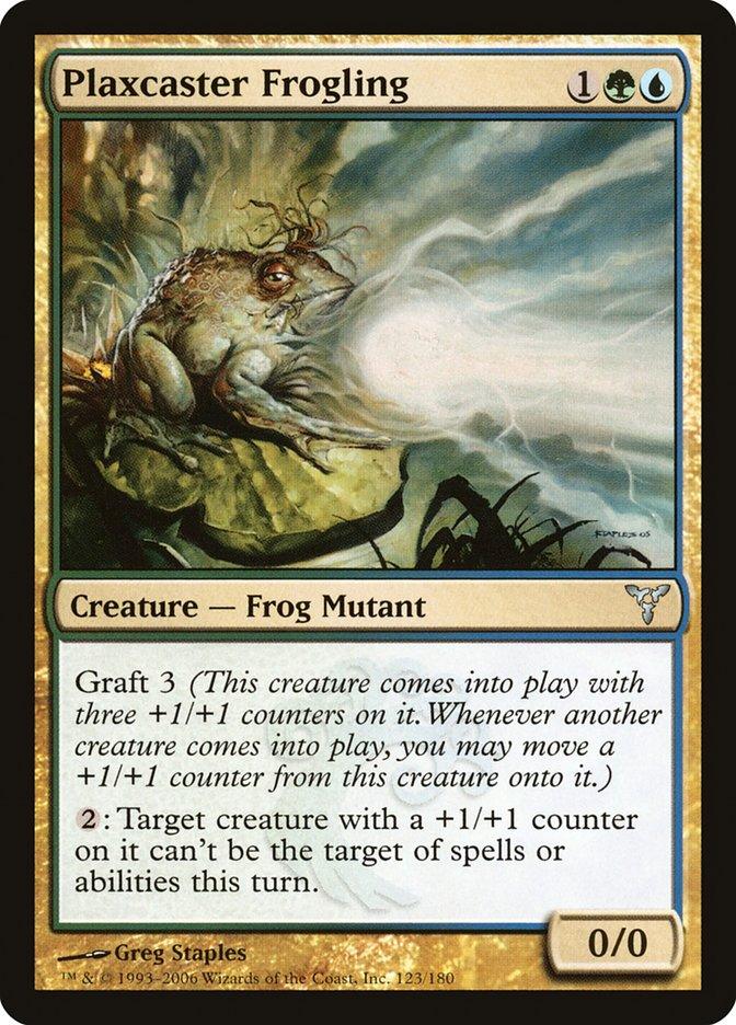 The image shows a "Plaxcaster Frogling" card from the Magic: The Gathering series, specifically from the Dissension set. It costs one green mana, one blue mana, and one generic mana to play. As a Frog Mutant with Graft 3, this card accumulates +1/+1 counters and can provide shroud to protect against targeting effects. Greg Staples is credited for the artwork.