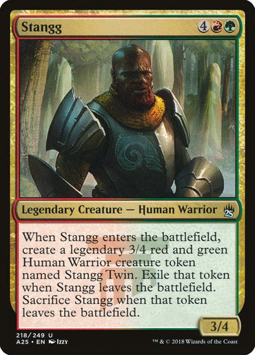 A Magic: The Gathering card from the Masters 25 set, **Stangg [Masters 25]** costs 4 generic, 1 red, and 1 green mana. The illustration shows a bearded, armor-clad Human Warrior. As a Legendary Creature, Stangg's abilities include creating a 3/4 twin token upon entry. The card's black border signifies its rarity. Power and toughness are