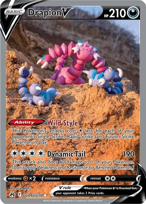A Pokémon trading card featuring Drapion V (GG49/GG70) [Sword & Shield: Crown Zenith]. The card, part of the Pokémon Sword & Shield series, shows a scorpion-like creature with a segmented purple body, clawed arms, and a fierce expression. It has 210 HP and the abilities "Wild Style" and "Dynamic Tail." This Ultra Rare card includes attack details and artwork of related Pokémon in the background.