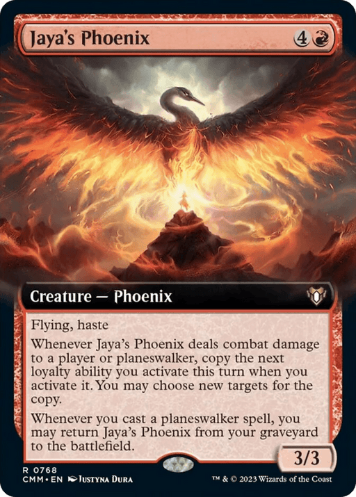 An image of the Magic: The Gathering card "Jaya's Phoenix (Extended Art) [Commander Masters]" from Commander Masters. It depicts a fiery phoenix with wings spread wide, emerging from a volcano. The card costs 4R, is a Creature — Phoenix, has flying and haste abilities, and a power/toughness of 3/3. Art by Justyna Dura.