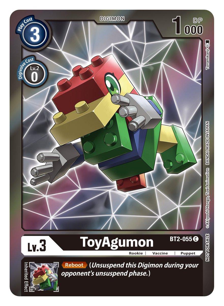 A Digimon trading card features ToyAgumon [BT2-055] (Event Pack 2) [Release Special Booster Ver.1.0], a brightly colored, blocky dinosaur made up of red, yellow, green, and blue parts akin to toy building blocks. This Rookie-level card from the Special Booster Ver.1.0 set has a play cost of 3 and includes the 'Reboot' inherited effect against a geometric, web-like background.
