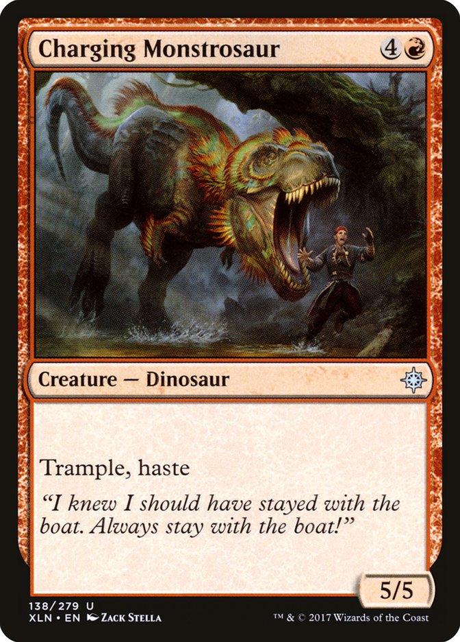 A Magic: The Gathering card titled Charging Monstrosaur [Ixalan] from the set Magic: The Gathering. It costs four generic mana and one red mana, depicting a rampaging dinosaur with sharp teeth. The card text includes 