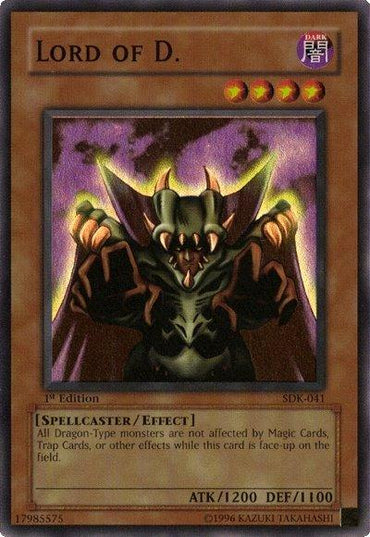 A **Yu-Gi-Oh!** trading card from the Starter Deck: Kaiba titled **"Lord of D. [SDK-041] Super Rare"** features a menacing, cloaked figure with horns and claws. This 1st Edition Effect Monster protects Dragon-Type monsters from magic, trap, or other effects while face-up. It boasts 1200 attack and 1100 defense points.