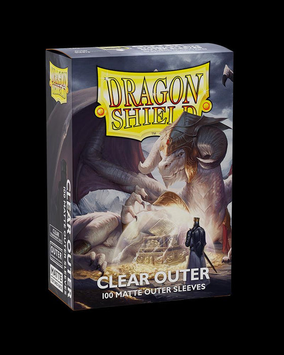 Box of Dragon Shield: 100ct Outer Sleeves - Clear Matte (Standard) by Arcane Tinmen with a fantasy-themed illustration. The image depicts a knight walking towards a large, fierce dragon guarding treasure. The dragon is surrounded by mist, and its wings are partially unfolded. The box provides top-tier card protection with 100 matte outer sleeves.