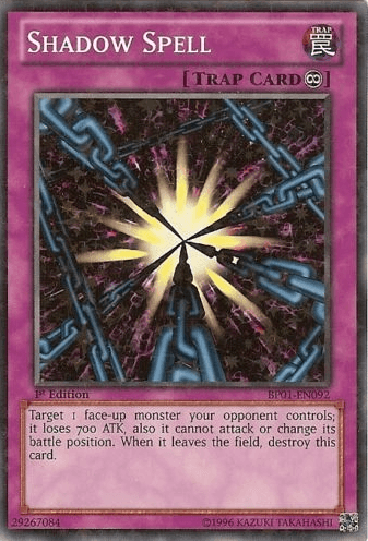 A Yu-Gi-Oh! trading card titled "Shadow Spell [BP01-EN092] Starfoil Rare" with a purple border and Starfoil Rare finish. It shows a glowing yellow burst breaking through chains. As a Continuous Trap from the Battle Pack: Epic Dawn, this card targets one face-up monster your opponent controls; it loses 700 ATK and cannot attack or change its battle position.