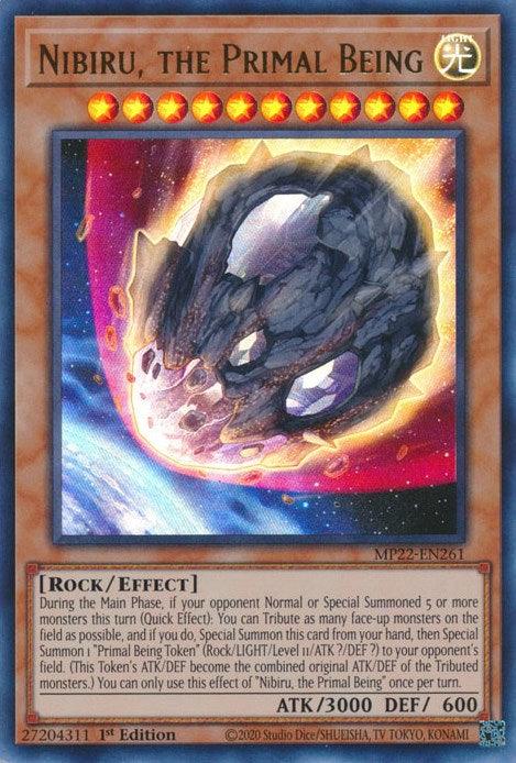 Image of the "Nibiru, the Primal Being [MP22-EN261] Ultra Rare" Yu-Gi-Oh! trading card from the 2022 Tin of the Pharaoh's Gods. This Ultra Rare card features a glowing, fiery meteor-like rock in space. Text details its light attribute, rock type, and special effects. It has 3000 attack points and 600 defense points and is marked as a 1st