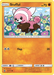 A Stufful (55/111) [Sun & Moon: Crimson Invasion] Pokémon card from the Sun & Moon: Crimson Invasion series features the pink and brown bear with a white face marking frolicking in a colorful flower field. This Fighting type card has an HP of 70, with a move called “Flop” that deals 30 damage, and includes an illustration by Kanako Eo. Rarity: Common.