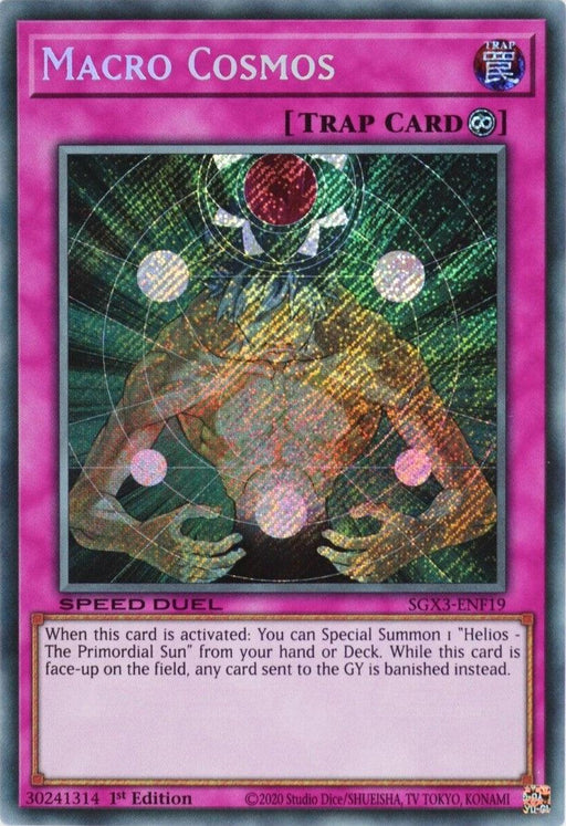 A Yu-Gi-Oh! trap card named "Macro Cosmos [SGX3-ENF19] Secret Rare," featuring a pink border with "TRAP CARD" at the top. The artwork showcases a celestial figure surrounded by glowing orbs on a green background. As a Secret Rare Continuous Trap, this card's effect is detailed in its text and it belongs to the Speed Duel GX series.