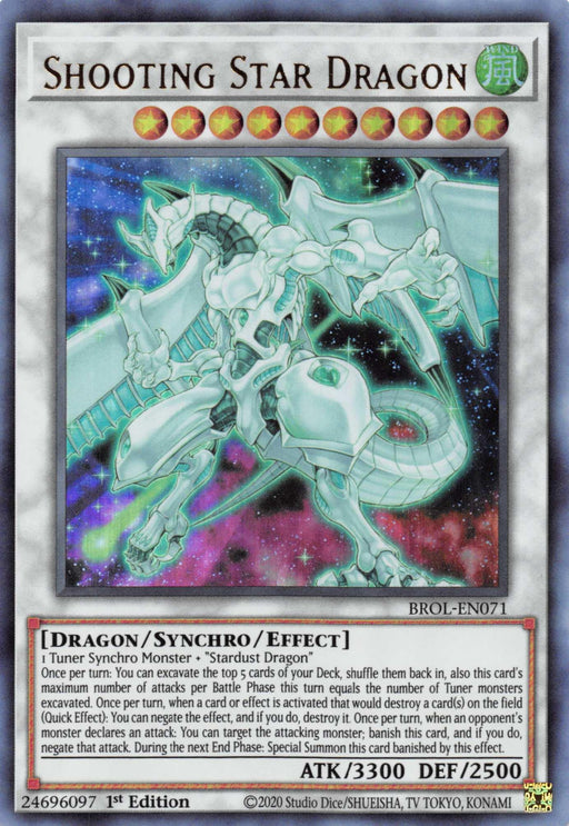 Image of a Yu-Gi-Oh! trading card named "Shooting Star Dragon [BROL-EN071] Ultra Rare," an Ultra Rare Synchro/Effect Monster. The card features a majestic, steel-blue dragon with luminescent, crystalline wings and a dynamic, cosmic background. With ATK 3300 and DEF 2500, its text describes its special summon and powerful capabilities.