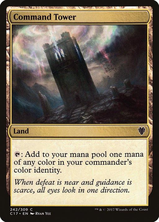 A dark, foreboding tower stands ominously on rocky terrain under a stormy sky with swirling clouds. The image is framed by a decorative border. The card, from Magic: The Gathering, is titled "Command Tower [Commander 2017]," classified as "Land," and reads "Add one mana of any color in your commander's identity.