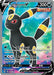 A Pokémon trading card featuring Umbreon V (188/203) [Sword & Shield: Evolving Skies] from the brand Pokémon. Umbreon, a black quadruped Pokémon with glowing yellow rings, stands against a colorful, swirling background. The Ultra Rare card's HP is 200 and includes moves “Mean Look” and “Moonlight Blade.” It’s a Single Strike card numbered 188/203.