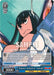 A Super Rare trading card from Bushiroad features a determined character with long dark hair, blue eyes, and white headwear, wearing a blue and white outfit. The card text details an ability related to "Life Fiber Override, Kamui Junketsu," providing a bonus. The character's name is "Kamui Junketsu" Satsuki from the Kill La Kill Power Up Set.