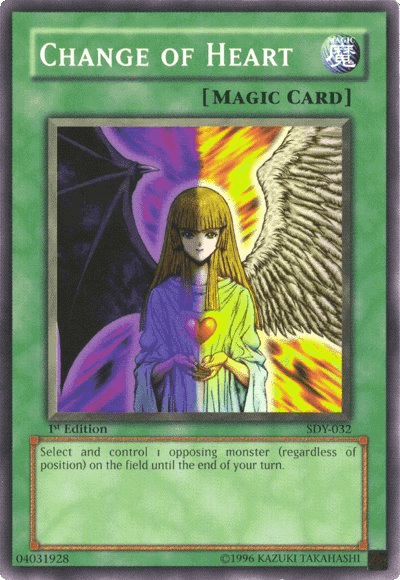 A "Change of Heart [SDY-032] Common" Yu-Gi-Oh! Normal Spell card, part of the Starter Deck: Yugi. The card features an angelic figure with long hair, holding a heart-shaped object with a glowing center. Half of the figure has angel wings and the other half demonic wings. Text reads: "Select and control 1 opposing monster... until the end of your turn.